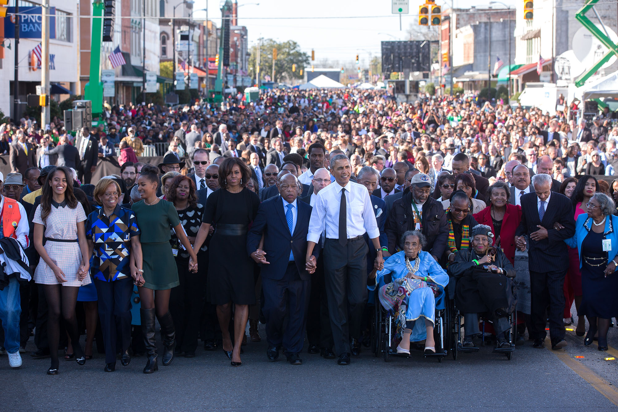 President Obama and the First Family lead the march across the Edmund Pettus Bridge, Selma, March 7, 2015. Official White House Photo by Pete Souza.